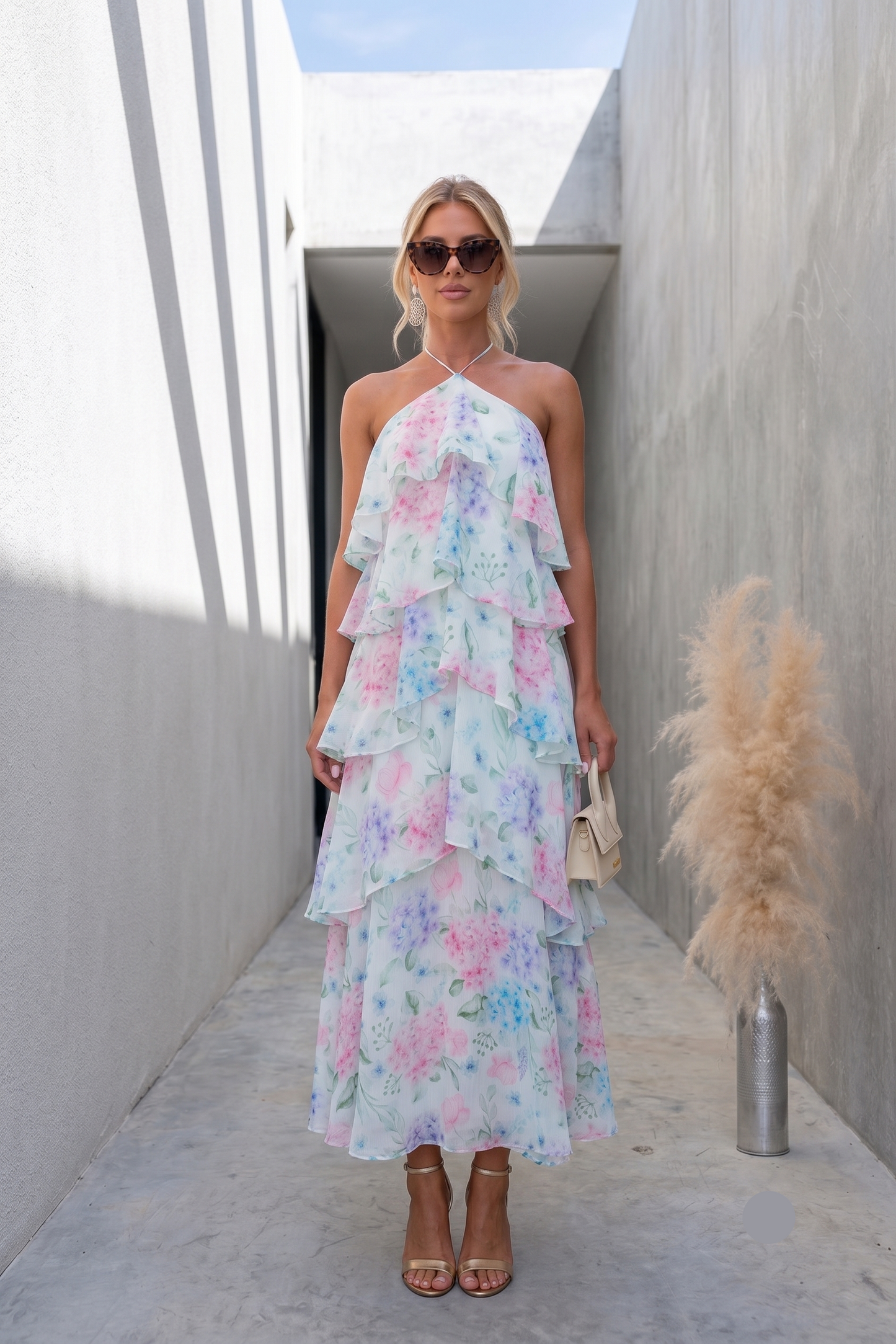 tiered A-line floral maxi dress, halter open back tiered maxi dress, Watercolor floral dress with flowing A-line silhouette and open-back tie closure, romantic maxi dress perfect for boho wedding guest dress styling and vacation-ready elegance, blue floral spring wedding maxi, cascading tiered ruffle maxi dress.