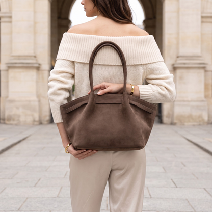 Designer inspired tote bag featuring a relaxed shoulder tote bag women silhouette, faux suede construction, spacious open interior, and gold hardware, created for airport travel tote bag and everyday sophistication.