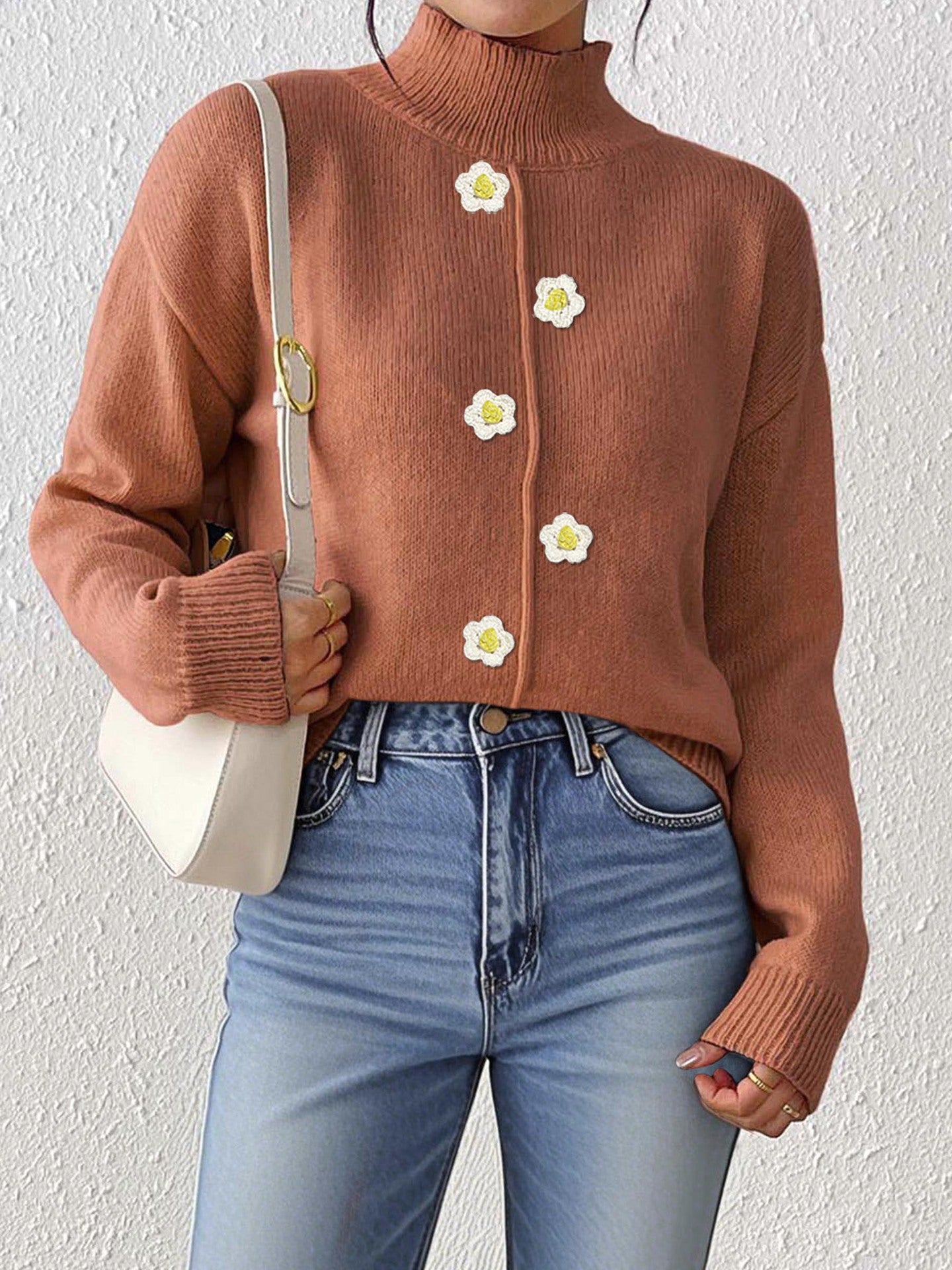 brown winter layering sweater, brown turtleneck sweater women, cute fall sweater, Chic mock-neck brown sweater with daisy buttons, soft cozy knit for women, ideal fall sweater for office wear, winter layering, and quiet luxury fashion looks.