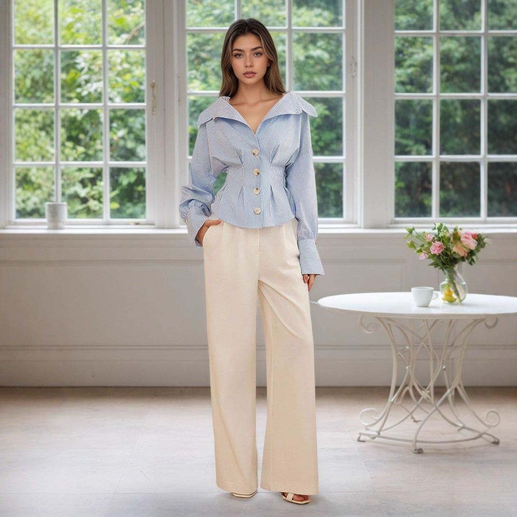 business casual pinstripe blouse, puff sleeve work shirt, blue white pinstripe shirt,  Structured shirt with vertical blue white pinstripe pattern, peplum shirt silhouette and tailored waist shaping, ideal business casual shirt and fall classy pinstripe outfit shirt option, structured waist shirt women.