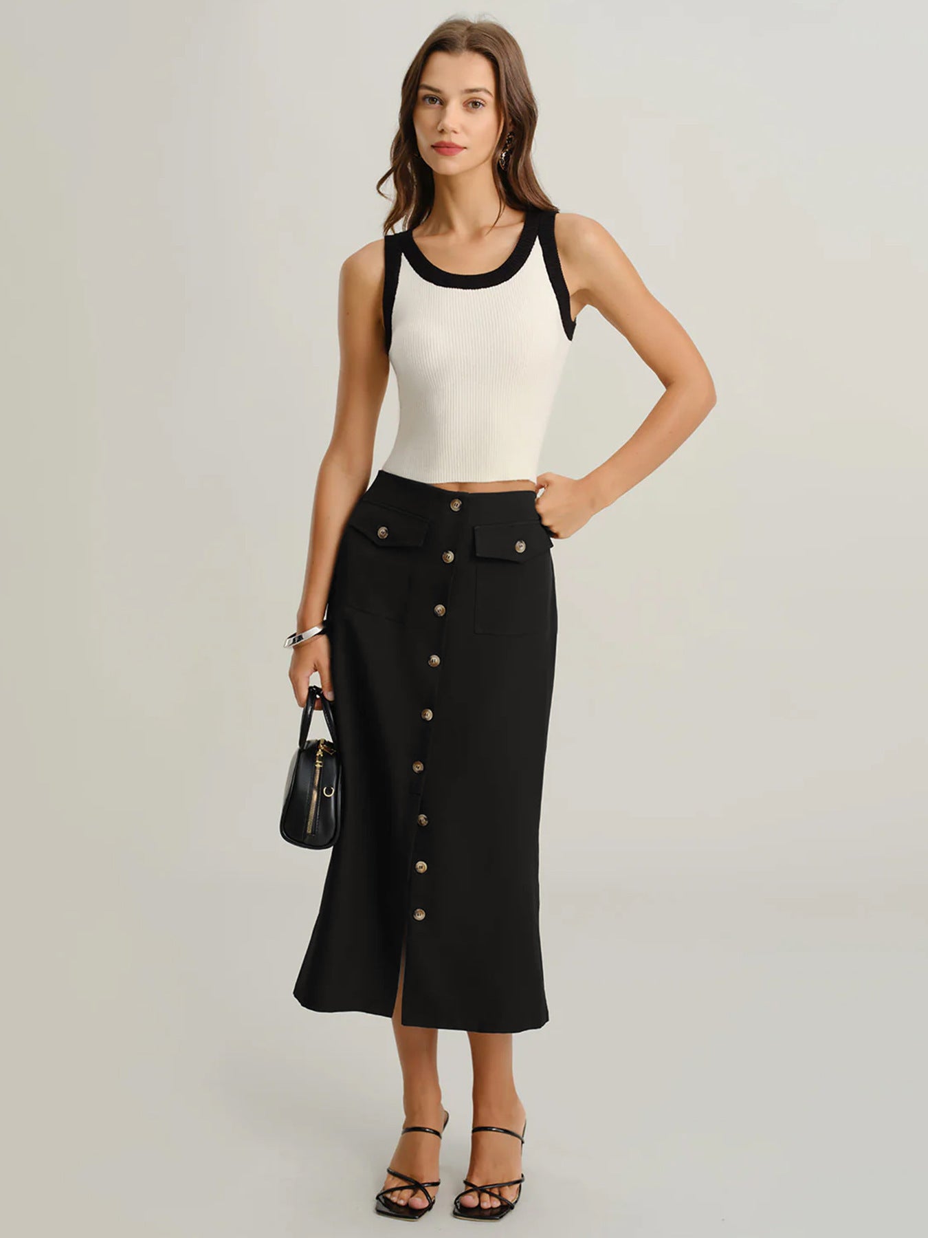 black midi skirt office outfit women, high waisted black midi skirt with buttons, button front midi skirt work outfit, black midi skirt with slit outfit, business casual midi skirt outfit women,  black pencil midi skirt outfit ideas, minimalist black midi skirt outfit,black midi skirt outfit for work.