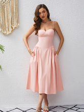 Load image into Gallery viewer, corset midi dress, fit and flare dress, pink corset dress, corset top dress, pleated skirt dress, pleated midi dress, pleated dress, pink corset sundress, midi swing dress, corset wedding guest dress, fit and flare cocktail dress, prom and dance dress, prom dress, plunging neckline dress, backless sundress, spring dresses for women, swing dresses for women, pink cocktail dress, classy dresses, fit and flair wedding guest dress.