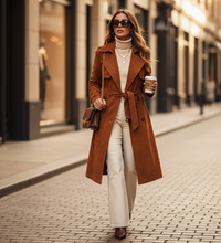 Load image into Gallery viewer, luxury trench coat women, workwear trench coat women, belted trench coat women, Women’s brown suede trench coat with belt, double-breasted front, and notched lapel collar. This elegant long trench coat pairs perfectly with boots for winter workwear or city layering outfits, faux suede long trench coat women.