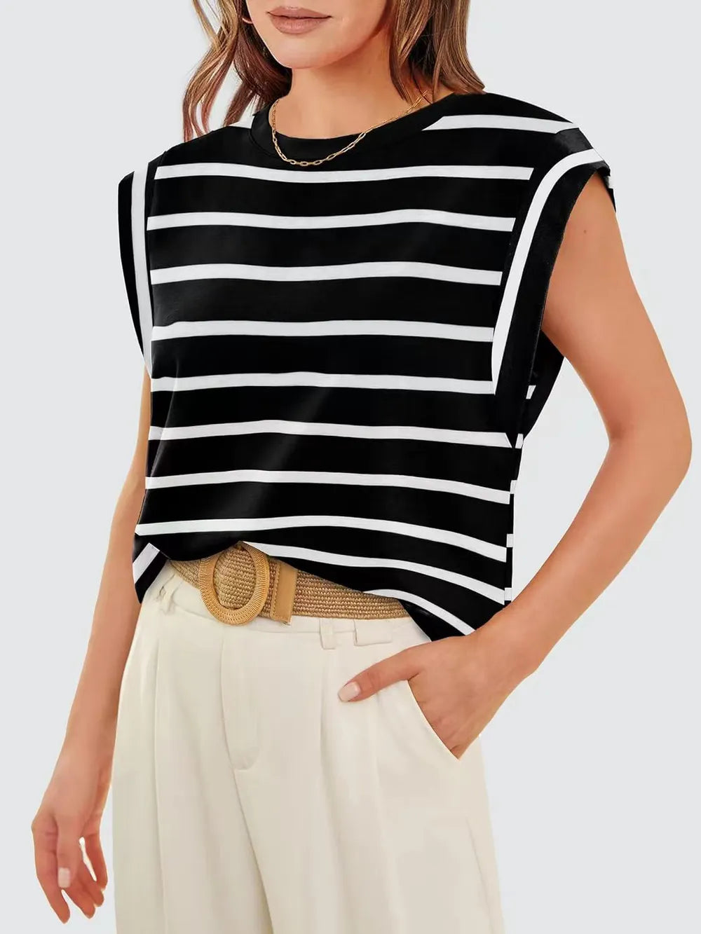 boat neckline striped top, casual workwear summer top, expensive looking basics women, capsule wardrobe essentials women, Women’s striped summer blouse in soft draped fabric with cap sleeve detailing, quiet luxury casual top for travel capsule wardrobes and hot weather everyday outfits, flattering tops for broad shoulders.
