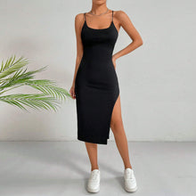 Load image into Gallery viewer, Women’s sleek black bodycon slit midi dress, spaghetti strap little black dress outfit, chic cocktail-ready LBD, affordable black midi dress for date night, travel, vacation dinner or party wear.