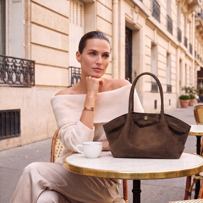 Oversized slouchy tote featuring a soft velvety matte tote bag finish, long shoulder straps, and roomy interior, perfect as a work tote bag laptop for commuting, meetings, and daily essentials.