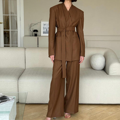 Cocoa Pinstripe Power Fancy Pantsuit Set tailored two-piece with belted blazer and high-waist wide-leg trousers. A wrinkle-free brown pinstripe dressy pantsuit set women wear for boardrooms and travel; perfect for elegant tailored two piece pantsuit set for business meeting and wrinkle-free two piece brown pantsuit for travel/work.
