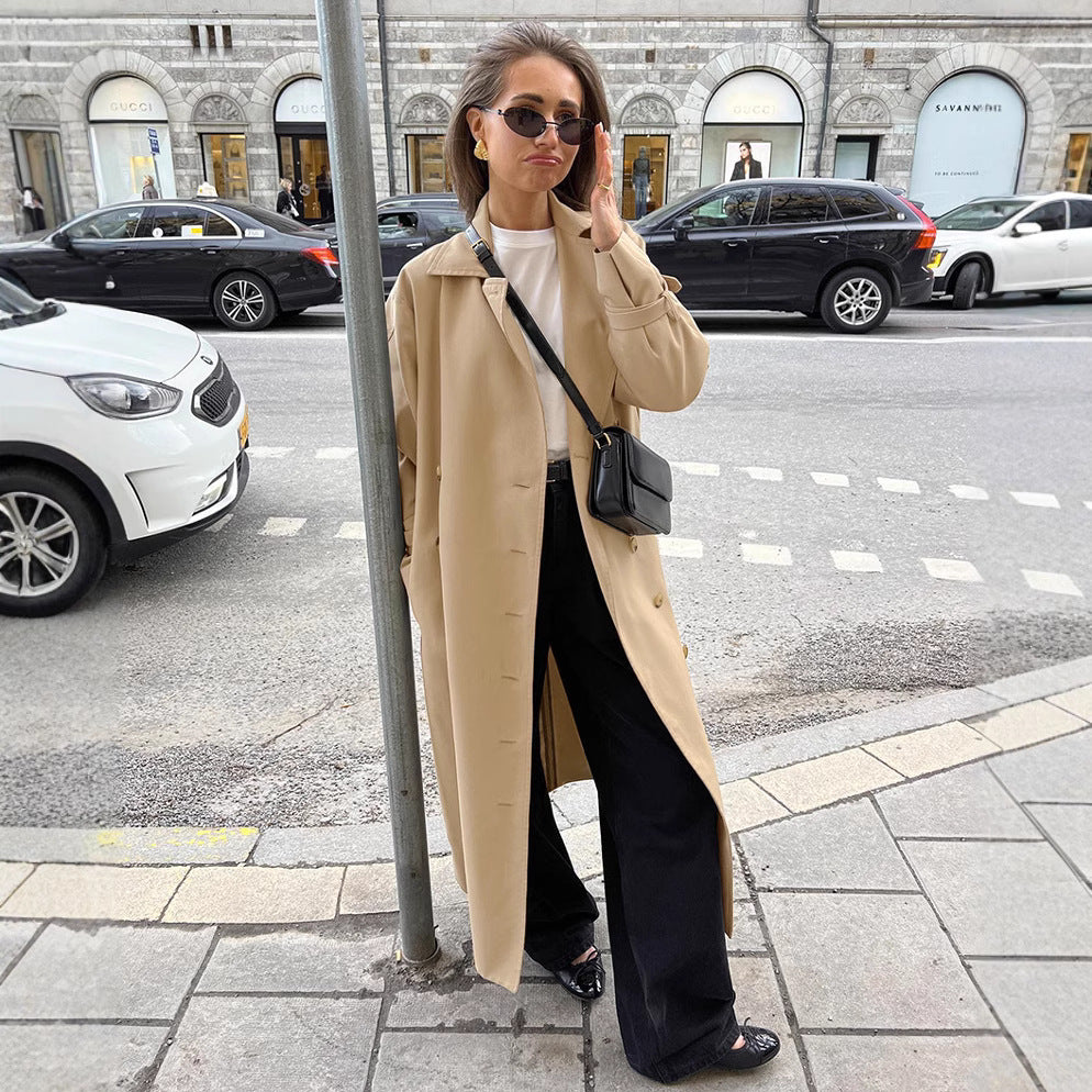 Double breasted trench coat women in warm beige with belted cuffs, classic city double breasted trench coat women aesthetic for smart casual trench coat outfit and fall layering outfits, classic beige trench coat outfit, belted trench coat for work women.
