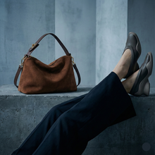 Load image into Gallery viewer, brown slouchy tote bag, slouchy shoulder bag, best suede handbag for women, what to wear with suede hobo bag, everyday shoulder bag, slouchy shoulder bag, suede hobo bag in brown color, Travel-friendly tote, quiet luxury suede bag.