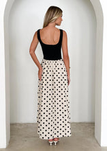 Load image into Gallery viewer, Contrast waist maxi dress with square neck polka dot maxi dress design, fitted black bodice maxi skirt and cream polka dot summer dress flow, ideal fall wedding guest polka dot dress look.