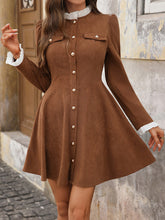 Load image into Gallery viewer, Corduroy stand-collar mini dress with gold button front and long sleeves, fit and flare dress, business casual dress women love for quiet luxury fall fashion and old money aesthetic, business casual dress women, button front mini dress women, old money dress women.