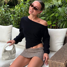 Load image into Gallery viewer, Off-shoulder asymmetrical long sleeve top, draped going-out blouse for women, chic outfit for brunch, cocktail parties, and casual chic autumn capsule wardrobe.