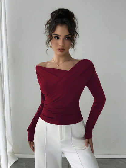 Chic burgundy off shoulder wrap blouse, slim fit fall fashion top styled as elegant office wear blouse, business casual outfit, versatile brunch to evening look, Pinterest trending women’s top, trendy desk to dinner top, perfect brunch outfit or elegant business casual blouse.