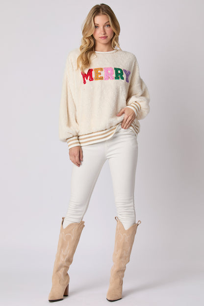 Statement holiday sweater for women with colorful “MERRY” sequin letters, crew neck, and ribbed striped hem a plush winter sweatshirt made for cozy December days, festive fuzzy sweater women, cute holiday sweatshirt women, merry christmas sequin sweatshirt women