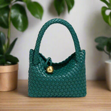 Load image into Gallery viewer, Emerald green sling bag, woven leather crossbody sling bag, sling purse, clutch bag, crossbody woven bag, satchel bag, beach bag, leather sling bag, rattan bag, basket bag, sling bag women, coach crossbody bag, sling bag women, best beach bag, woven texture crossbody sling bag.