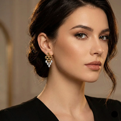 fashion earrings women, elegant drop earrings, classy gold earrings, gold accessory trends. Geometric gold dangle earrings with sparkling crystal stones and a sleek rhombus shape. Lightweight fashion earrings for women, ideal for workwear, party wear, weddings, and elegant night-out looks.