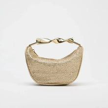 Load image into Gallery viewer, Crossbody woven bag, sculptural handle purse, terracotta shoulder bag for evening soiree handbag, lightweight designer look tote, straw sling bag, woven sling bag, bucket sling bag, crossbody straw sling bag, raffia sling bag, chic woven sling purse.
