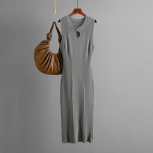 Load image into Gallery viewer, layering dress, slim fit bodycon dress, minimalist chic dress, Women’s sleeveless round neck knit dress slim midi dress for evening outfit, travel dress, minimalist wardrobe essential, in cream, black, brown, red and grey. 