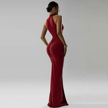 Load image into Gallery viewer, halter high neck bodycon dress, Burgundy high neck evening gown for party featuring ruched maxi dress women shaping, sculpted hourglass maxi gown for formal events, classic full length gown women with slit detail and sleek sleeveless evening gown style.