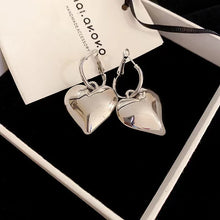 Load image into Gallery viewer, heart earrings, dangle heart shaped earrings,  dangle earrings, drop heart earrings, heart drop earrings, jewelry earrings, drop earrings, long earrings, fun quirky earrings for women, heart earrings for women, Quirky earrings for women, Chic earrings for women, Statement earrings, everyday jewelry, Modern fashion earrings.
