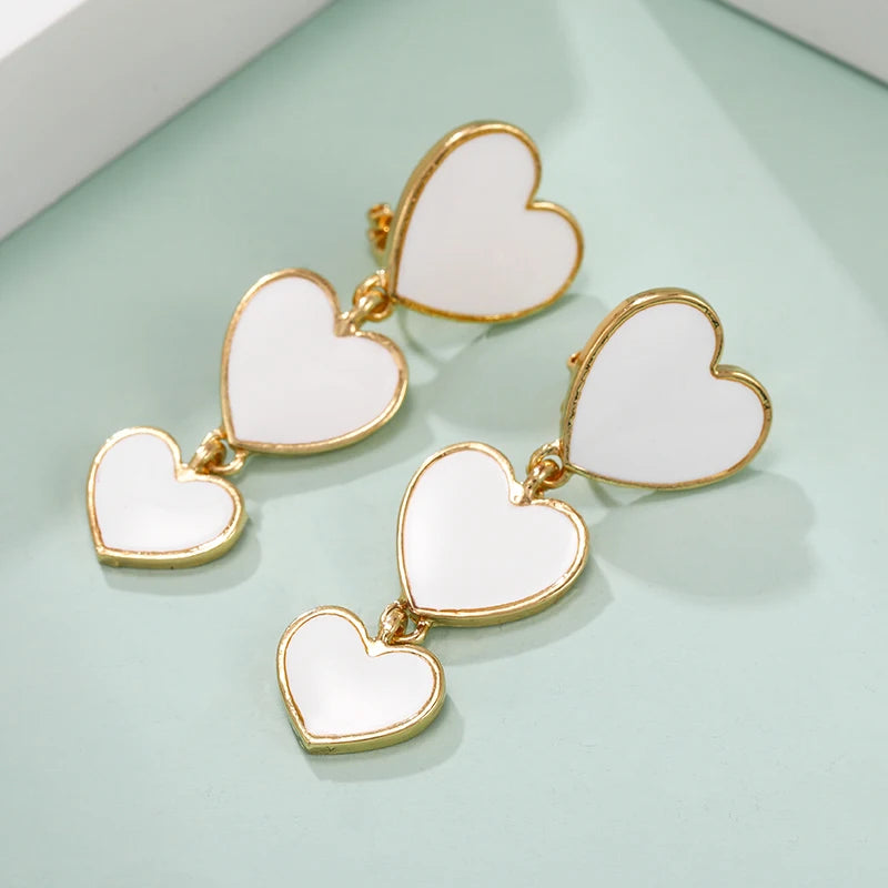 drop clip on heart earring, drop heart earrings, heart drop earrings, non pierced earrings, jewelry earrings, drop earrings, long earrings, party wear earrings, fun quirky earrings for women, earrings for women