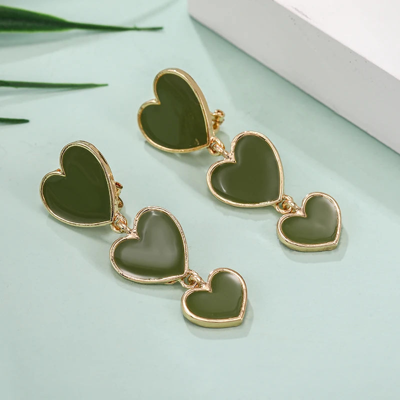 Green heart shaped earrings, drop clip on heart earring, drop heart earrings, heart drop earrings, non pierced earrings, jewelry earrings, drop earrings, long earrings, party wear earrings, fun quirky earrings for women, Pink earrings for women, 
