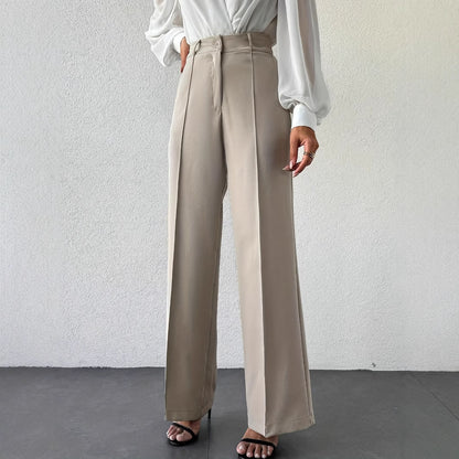Tailored column wide-leg trousers for women, high waist neutral beige office pants, business casual French minimalist travel wardrobe essential.
