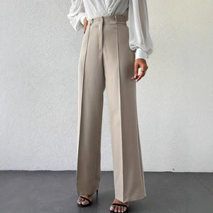 Tailored column wide-leg trousers for women, high waist neutral beige office pants, business casual French minimalist travel wardrobe essential.