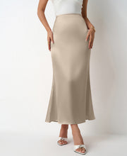 Load image into Gallery viewer, Satin midi slip skirt for women in red, ivory, pink, navy, black &amp; light pink. High waist bias cut skirt perfect as workwear outfit, wedding guest look or chic date night style.