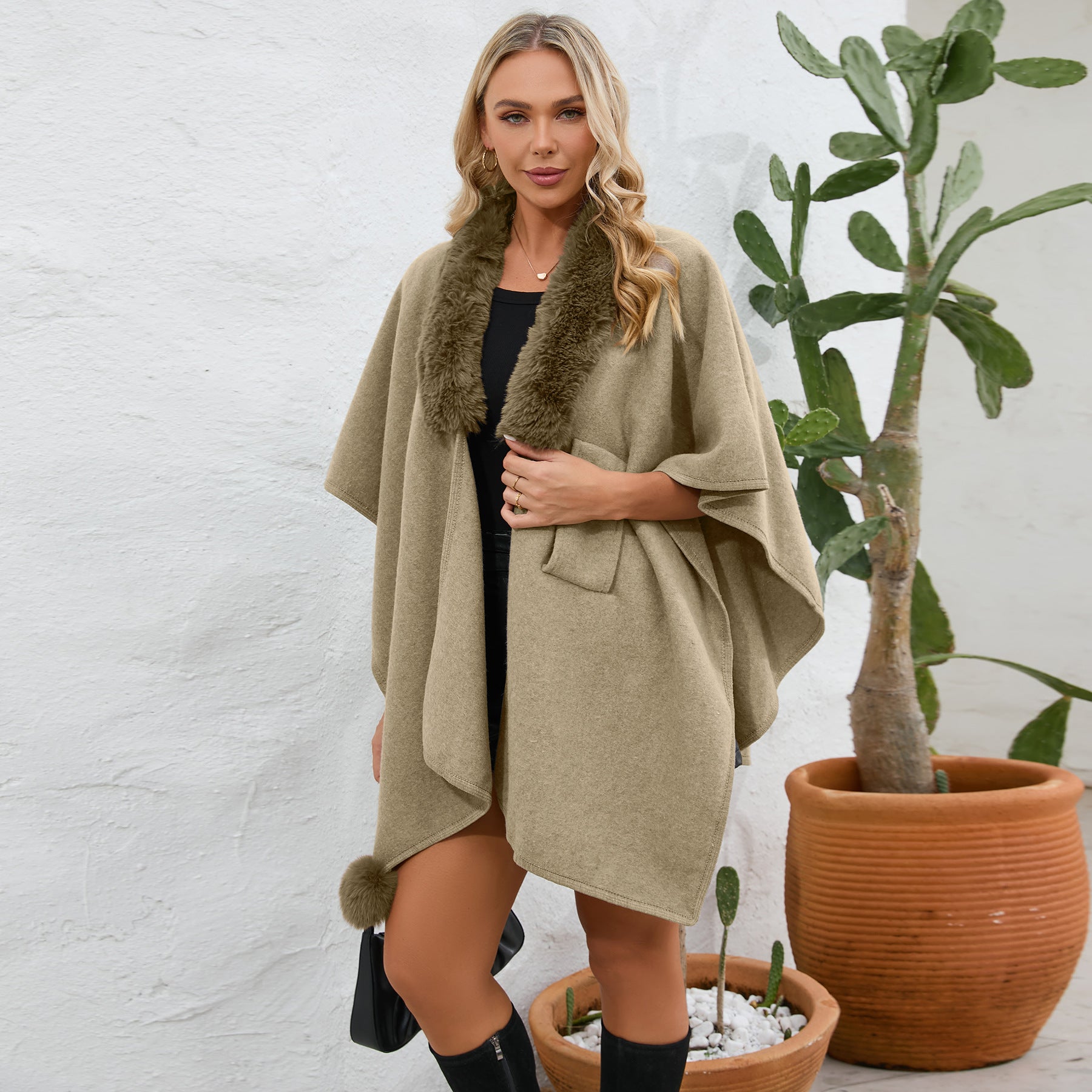 cape shawl, cape poncho, oversized fur cape, womens winter clothing, fur trim cape shawl, fur cape, sweater top, poncho sweater, cape coat women, oversized knit cape, poncho cardigan, stylish winter coats for women, fur cape, fur collar cardigan, fur collar sweater, poncho shawl, fashionable women's outerwear.