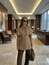 Load image into Gallery viewer, womens cape collar jackets, Blazer jacket women meets cape design in this tailored cape overlay jacket, single breasted, hip length, polished business casual jacket with quiet luxury and old money aesthetic, Tailored cape jacket women with structured fit, single breasted jacket design and cape overlay, ideal business casual jacket for office wear, quiet luxury jacket style, hip length tailored jacket women.
