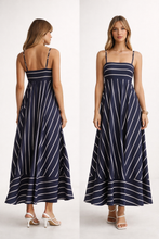 Load image into Gallery viewer, A line striped high waist maxi, spaghetti strap maxi, Spaghetti strap striped maxi with vertical stripe maxi skirt and structured upper, navy blue maxi dress with A-line sweep, breathable striped maxi dress for summer evening striped maxi occasions, long flowy summer maxi dress women.