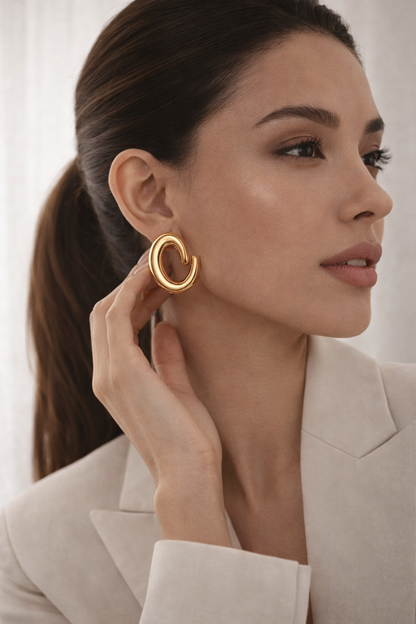 modern hoop sculptural earrings, chunky gold hoop earrings for women, minimalist statement hoop earrings, lightweight chunky gold earrings, bold gold hoop earrings outfit, modern sculptural hoop earrings, everyday chunky hoop earrings women.
