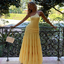 Load image into Gallery viewer, tiered maxi dress, one shoulder backless maxi dress, butter yellow vacation maxi dress, date night dress, summer party dress, rooftop party outfit, evening maxi dress with spaghetti straps, glamorous maxi dress for evening events, best dress for cocktail wedding guest.