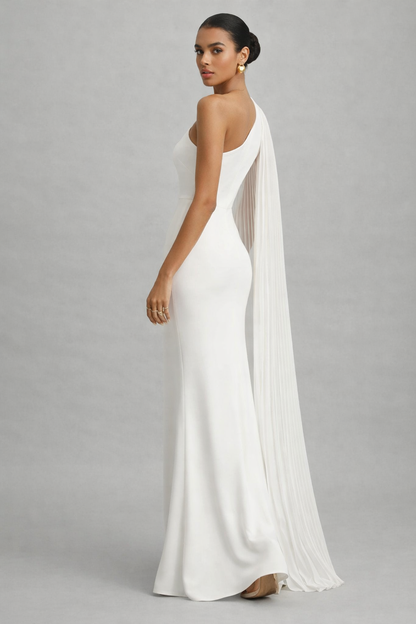 one shoulder pleated cape evening gown, white one shoulder formal evening dress, pleated chiffon cape one shoulder gown, One shoulder evening gown in bodycon silhouette with pleated cape sleeve detail, suited for wedding guest dresses and evening party dresses with maxi length formal structure and clean finish.