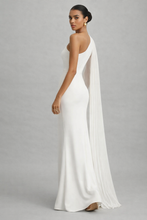 Load image into Gallery viewer, one shoulder pleated cape evening gown, white one shoulder formal evening dress, pleated chiffon cape one shoulder gown, One shoulder evening gown in bodycon silhouette with pleated cape sleeve detail, suited for wedding guest dresses and evening party dresses with maxi length formal structure and clean finish.