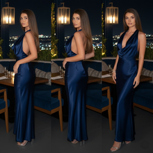 Load image into Gallery viewer, satin halter maxi dress, plunging halter maxi, bias cut satin dress, open back halter gown, midnight blue maxi dress, satin cocktail maxi, halter neck satin gown, High-shine satin maxi, Plunging V halter neck gown, Fluid straight maxi skirt satin, Body-skimming bias cut dress