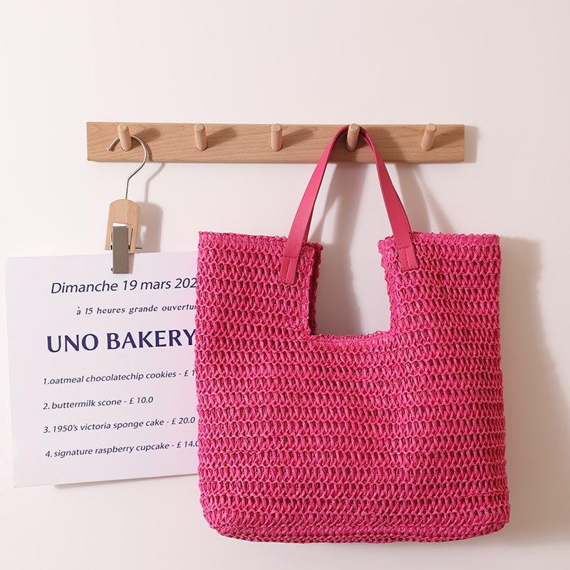 wicker tote bag, straw shoulder bag, straw beach tote, Straw beach bag with braided straw weave handbag texture and oversized shoulder silhouette, seagrass bag inspired material styled as straw market tote for beach day, ideal beach essentials bag, summer shoulder bag.