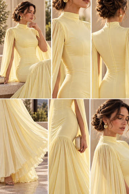 Yellow formal wedding guest gown for women featuring long cape sleeves, fitted bodice, high neckline and flowing pleated maxi skirt, combining elegant coverage and dramatic movement for evening receptions.