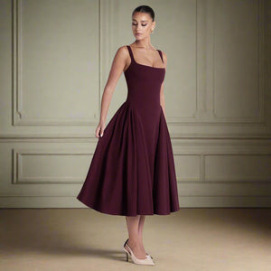  fit and flare dress, corset midi dress, pleated midi dress, pleated dress, flattering midi dress with corset bodice, cocktail midi dress with fitted top, burgundy fit and flare dress for evening events, flattering midi dress with fitted top and flared skirt.