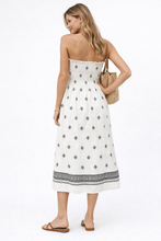 Load image into Gallery viewer, strapless tube midi dress, smocked midi dress, Cream smocked strapless midi dress with geometric print, printed A-line strapless midi silhouette and lightweight smocked midi dress flow for summer vacation smocked midi and resort occasion wear styling, A-line midi dress.