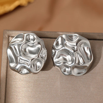 bold stud earrings, silver sculptural earrings, Workwear statement jewelry, bold stud earrings, silver stud earrings, statement stud earrings for women, workwear statement earrings, architectural stud earrings, silver abstract earrings.