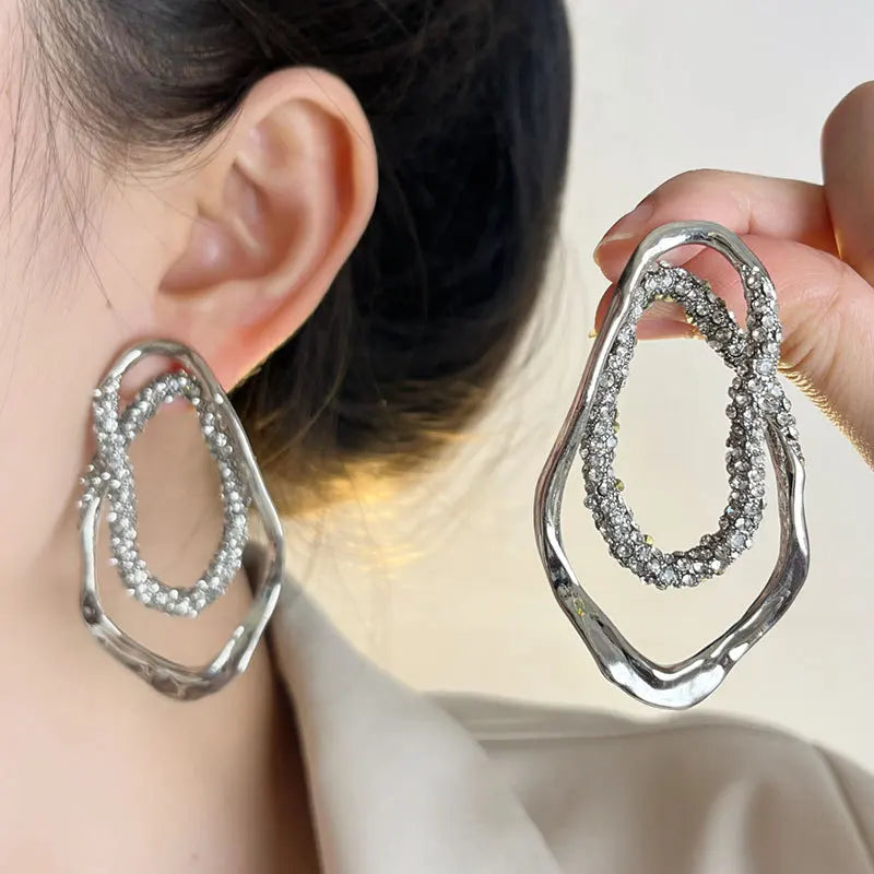 silver hoops, statement earrings, modern jewelery,  silver crystal earrings, Silver pavé crystal double-oval statement earrings with modern sculptural design, gold-tone option available, hypoallergenic and nickel-free, USA women’s jewelry.