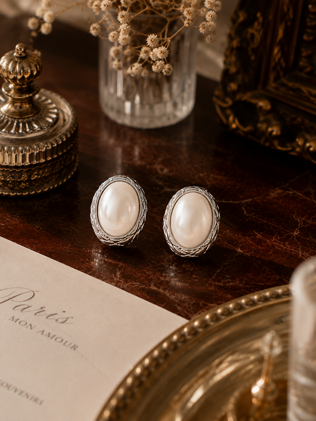 Women's pearl oval stud earrings crafted from 18K PVD plated stainless steel with luminous simulated pearls, designed as timeless everyday earrings for women seeking elegant, lightweight jewellery.
