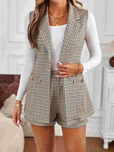 Load image into Gallery viewer, sleeveless blazer suit with shorts, Women’s tailored shorts suit outfit for brunch featuring beige plaid belted vest and high-waist shorts, perfect summer plaid co-ord set for women embracing quiet luxury, coordinated vest and shorts outfit, coord shorts set.