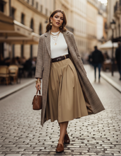 Load image into Gallery viewer, sleeveless midi dress for women, high-waist belt midi dress, fall transition dress midi, Elegant belted midi dress with pleated skirt in neutral color tone  ideal workwear dress for women and versatile office to dinner look for fall fashion.