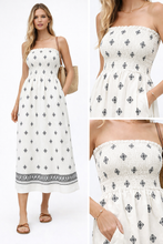Load image into Gallery viewer, Cream lightweight woven smocked strapless bodice A-line printed midi skirt for summer vacations, brunches, resort evenings.