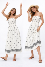 Load image into Gallery viewer, smocked strapless printed midi, geometric print A-line midi, resort wear midi 2026, strapless summer trend, Cream smocked strapless printed midi vacation dress.