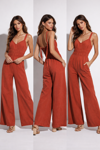 rust color wide leg jumpsuit, smocked jumpsuit, v neck jumpsuit, sleeveless jumpsuit, vacation jumpsuit, wide leg vacation jumpsuit, smocked waist jumpsuit, floor length wide leg jumpsuit, affordable jumpsuit under $100 