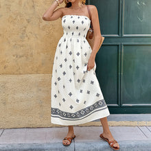 Load image into Gallery viewer, spring brunch printed midi dress, strapless midi hot weather , affordable smocked midi under $100, Printed midi dress with smocked bodice and strapless neckline, cream black print midi dress in relaxed A-line silhouette for spring brunch printed midi dress and resort occasion wear.